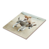 Carreau Puppies mignonnes jouer sur la plage (Côté)