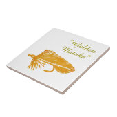 Carreau Tuile de mouche à oreille "Golden Matuka". (Côté)