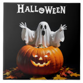 Carreau Un fantôme ludique émerge d'un citrouille sculpté (Devant)