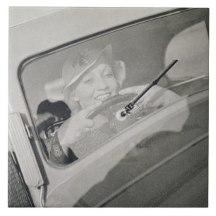 Carreau Une femme conduisant, c.1930s (photogravure)