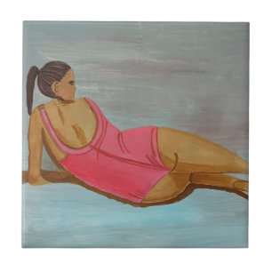 Carreau Une femme en costume de natation rose
