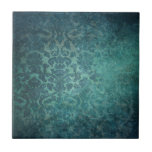 Carreaux bleu vintage<br><div class="desc">Design damassé richement stratifié et ombragé en bleu profond.</div>