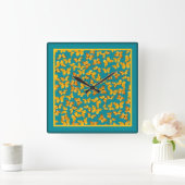 Carrée Horloge murale, Papillons dorés sur Turquoise (Maison)