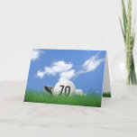 Carte 70th birthday golf ball in grass<br><div class="desc">White golf ball in green grass with golf club and sky background for 70th birthday.</div>