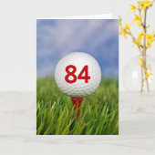 Carte 84e anniversaire Golf Ball on Red Tee Card (Fleur jaune)