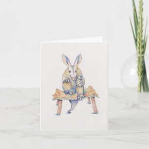 Carte Aardvark assis sur son tabouret en buvant un verre