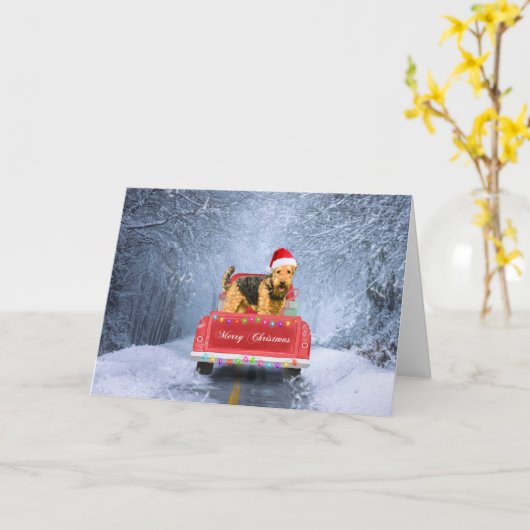 Carte Airedale Terrier Chien en Neige assis à Noël (Fleur jaune)