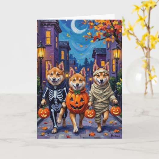 Carte Akita Chiens Trick-or-Treating en costumes d'Hallo (Fleur jaune)