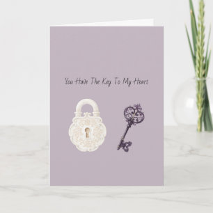 Carte Amour de clé violette de serrure blanche