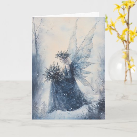 Carte Aquarelle Fée Bleue de Noël en terrain neigeux (Fleur jaune)