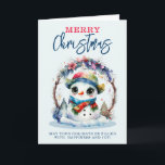 Carte Aquarelle Snowman<br><div class="desc">Une image aquarelle d'un mignon Snowman portant une écharpe et un casquette,  avec de grands yeux,  sur une couronne de Noël</div>