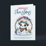 Carte Aquarelle Snowman<br><div class="desc">Une image aquarelle d'un mignon Snowman portant une écharpe et un casquette, avec de grands yeux, sur une couronne de Noël</div>