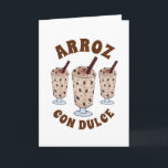 Carte Arroz con Dulce Pudding de riz à la noix de coco d<br><div class="desc">Le design présente une illustration originale d'un délicieux arroz con dulce, un pudding de riz portoricain composé de riz perlé mijoté avec du lait de coco, de la crème de coco, du lait concentré, d'épices et de raisins secs macérés dans du rhum. Cette friandise est particulièrement populaire à Porto Rico...</div>