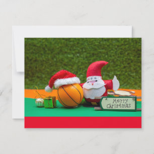 Carte Basket-ball avec chapeau de Santa avec joyeux Noël