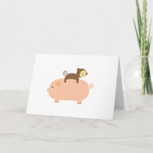 Carte Bébé singe équitation sur un cochon
