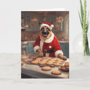Carte Berger allemand en costume de Père Noël cuisinant