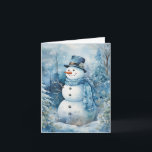Carte Bleu Snowman mignon Casquette & Fleurs d'Écharpe A<br><div class="desc">Adorable bonhomme de neige en casquette bleu et foulard dans une forêt profitant de cette journée d'hiver froide.</div>