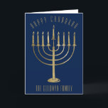 Carte bleue de Hanukah<br><div class="desc">Send your loved ones a personalized card this Chanukah season. This design feesta gold colored menorah on a navy blue background. Above it the message reads "Happy Chanukah". Below the menorah is a place for your family name which you may personalize or remove if you'd like. "Wishing you peace, love,...</div>