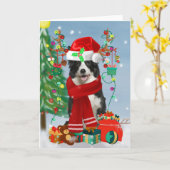 Carte Border Collie dans la neige avec des cadeaux de No (Fleur jaune)