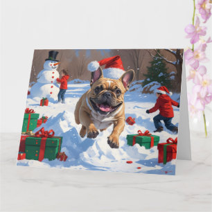 Carte Bouledogue français courant dans la neige avec un