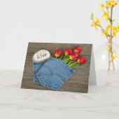 Carte bouquet de tulipe dans la poche de blue-jean (Fleur jaune)