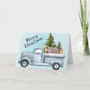 Carte Camion de Noël transportant des arbres et des anim