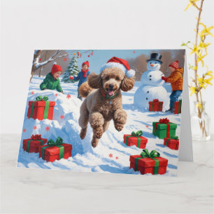 Carte Caniche courant dans la neige avec un chapeau de N