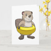 Carte Castor à la piscine avec un cercle de natation (Fleur jaune)