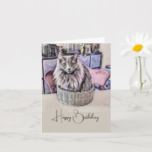 Carte Chat aux yeux verts dans un panier d'anniversaire