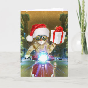 Carte Chat dans le chapeau du Père Noël livre un cadeau 