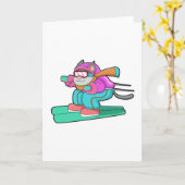 Carte Chat en sauteur à ski avec des skis et des lunette (Fleur jaune)