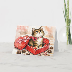Carte Chat heureux dans une boîte de cœur de bonbons de