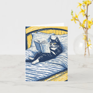 Carte chat lisant au lit