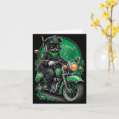 Carte Chat noir conduisant un vélo Saint-Patrick (Fleur jaune)