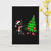 Carte Chat noir drôle poussant l'arbre de Noël sur le ch (Fleur jaune)
