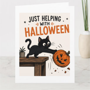 Carte Chat noir drôle renversant une citrouille Hallowee