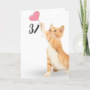 Carte chat tigré de 31 ans avec ballon en forme de cœur