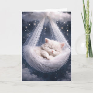 Carte Chaton blanc suspendu à un hamac en tulle et nuage