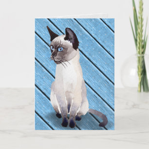 Carte chaton siamois d'anniversaire sur le bois bleu