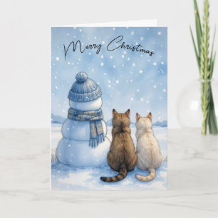 Carte Chats de Noël assis avec un bonhomme de neige dans