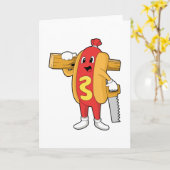 Carte Chaudron comme charpentier avec scie et bois (Fleur jaune)