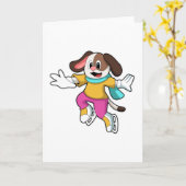 Carte Chien au patinage sur glace avec des patins à glac (Fleur jaune)