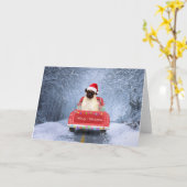 Carte Chien carlin en neige assis dans un camion de Noël (Fleur jaune)