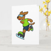 Carte Chien faisant du patin à glace avec des lunettes (Fleur jaune)