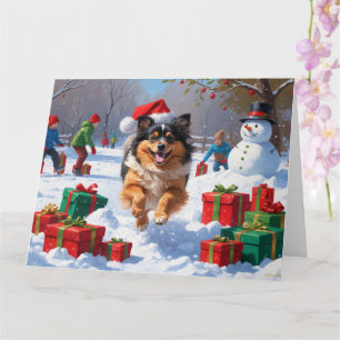 Carte Chien Keeshond courant dans la neige avec un chape