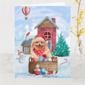 Carte Chien Pomeranian Dans Maison De Noël Enneigée (Fleur jaune)