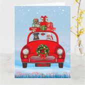 Carte Chien Rottweiler dans une voiture avec le Père Noë (Fleur jaune)