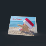 Carte Christmas starfish with Santa<br><div class="desc">étoiles de mer dans le sable de plage en fourrure rouge et blanche chapeau de Père Noël tropical</div>