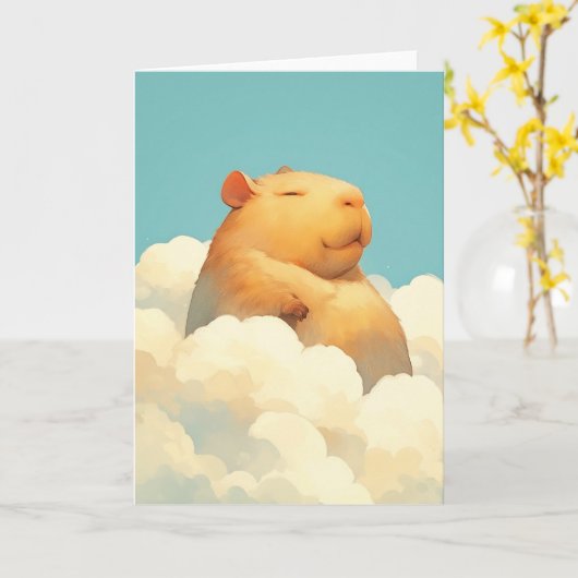 Carte Chubby Capybara se repose sur un nuage (Fleur jaune)