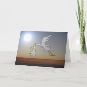 Carte cigogne blanche volant dans le ciel nocturne et la